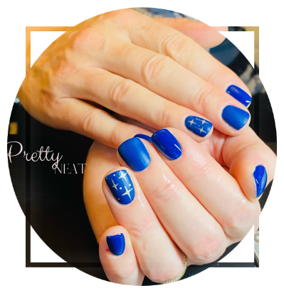 Clasped hands showing blue painted nails with silver stars Blue nails with silver stars