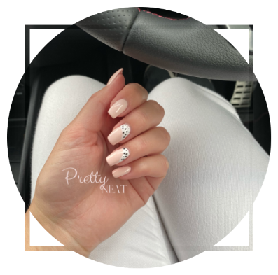 Pink finger nails with white painted cuticals and black spots Lacoured Pink nails
