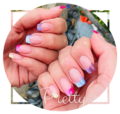 Clear coated nails with faded mauve light blue and red painted tips Clear nails with faded colour tips
